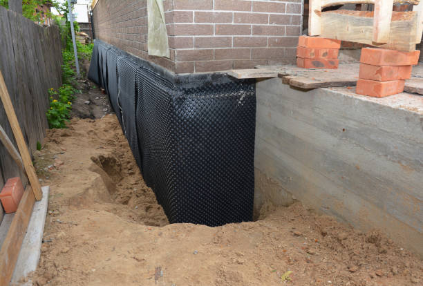 Happy homeowners after waterproofing job in Camden